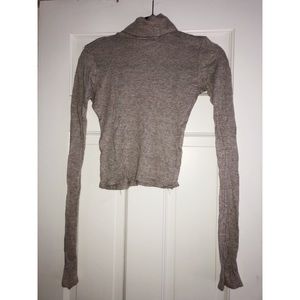 Fitted cropped turtleneck sweater